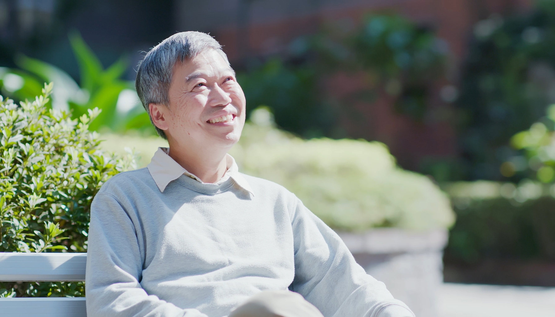 Person enjoying sunshine after cataract surgery